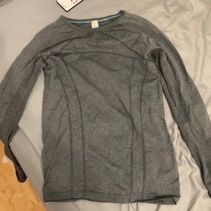 Ivivva by Lululemon, girls size 14 long sleeve, charcoal grey, lightly warn